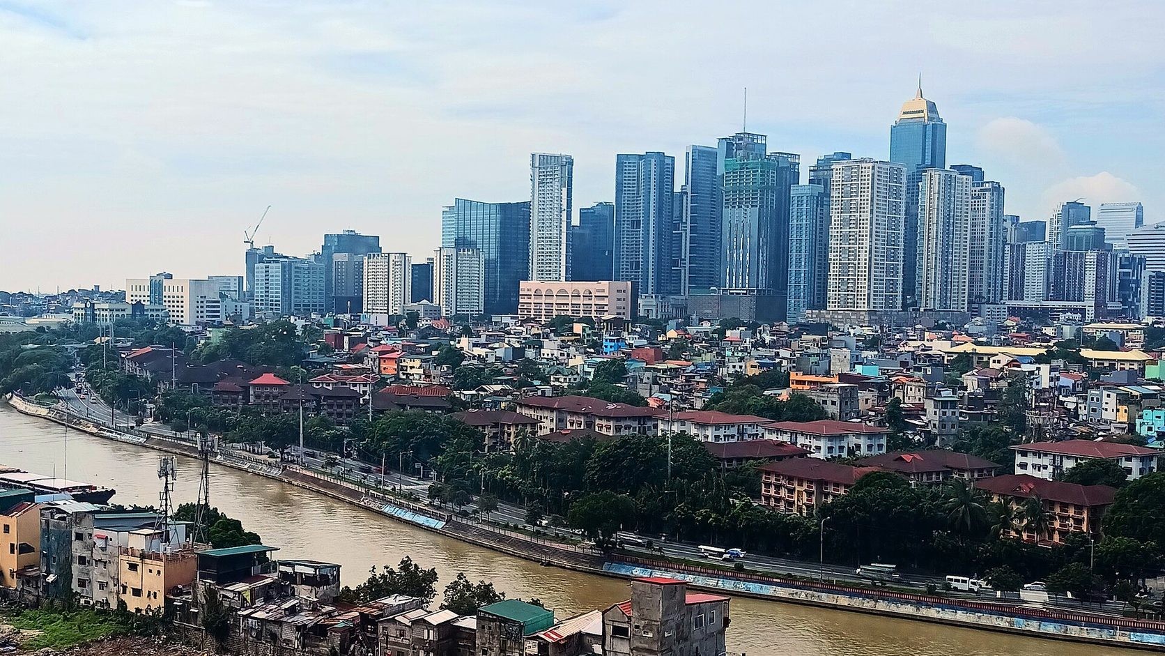 Bonifacio Global City skyline above the Pasig River in Metro Manila