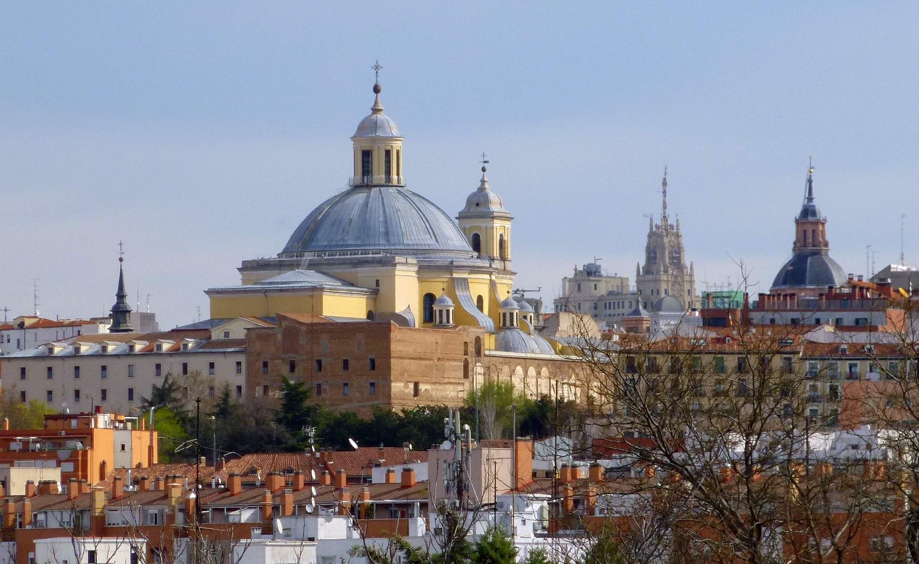 Madrid skyline seen from Cerro de San Isidro under a blue sky