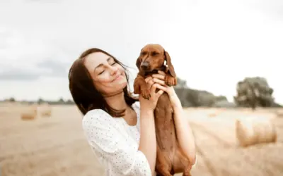 person holding dog